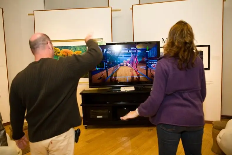 Microsoft release off-screen shots of kids and adults playing Natal