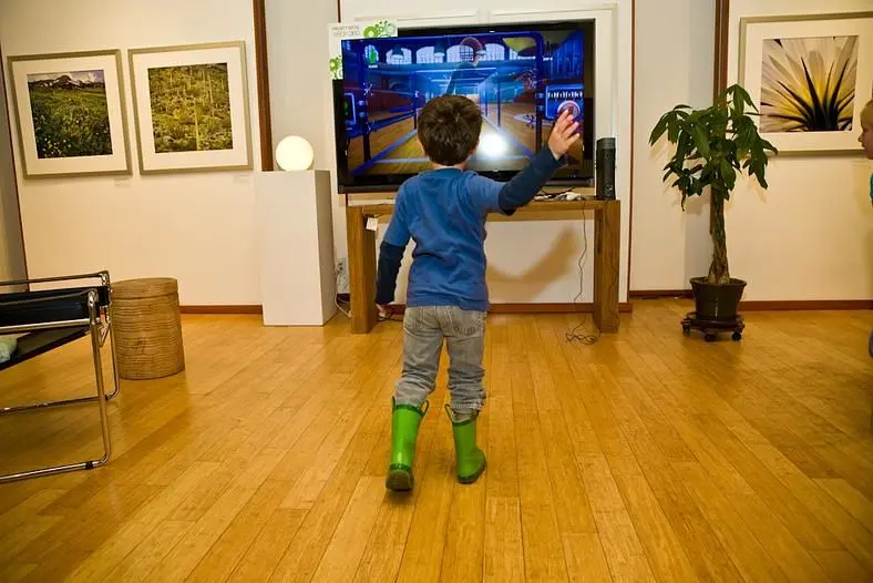 Microsoft release off-screen shots of kids and adults playing Natal