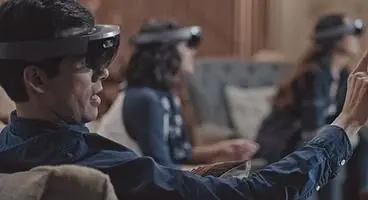 Microsoft shares vision of sports-viewing through Hololens, letting NFL players burst through your walls