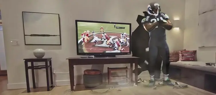 Microsoft shares vision of sports-viewing through Hololens, letting NFL players burst through your walls