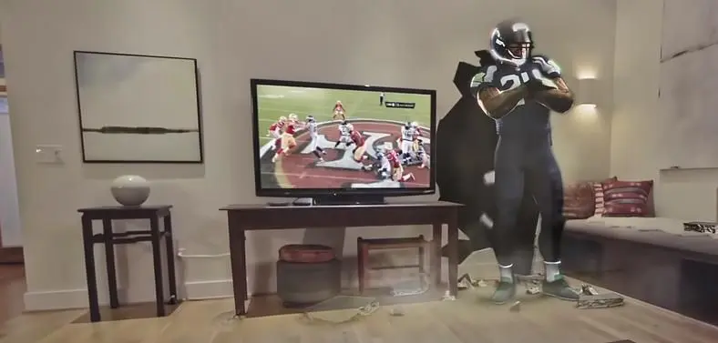 Microsoft shares vision of sports-viewing through Hololens, letting NFL players burst through your walls